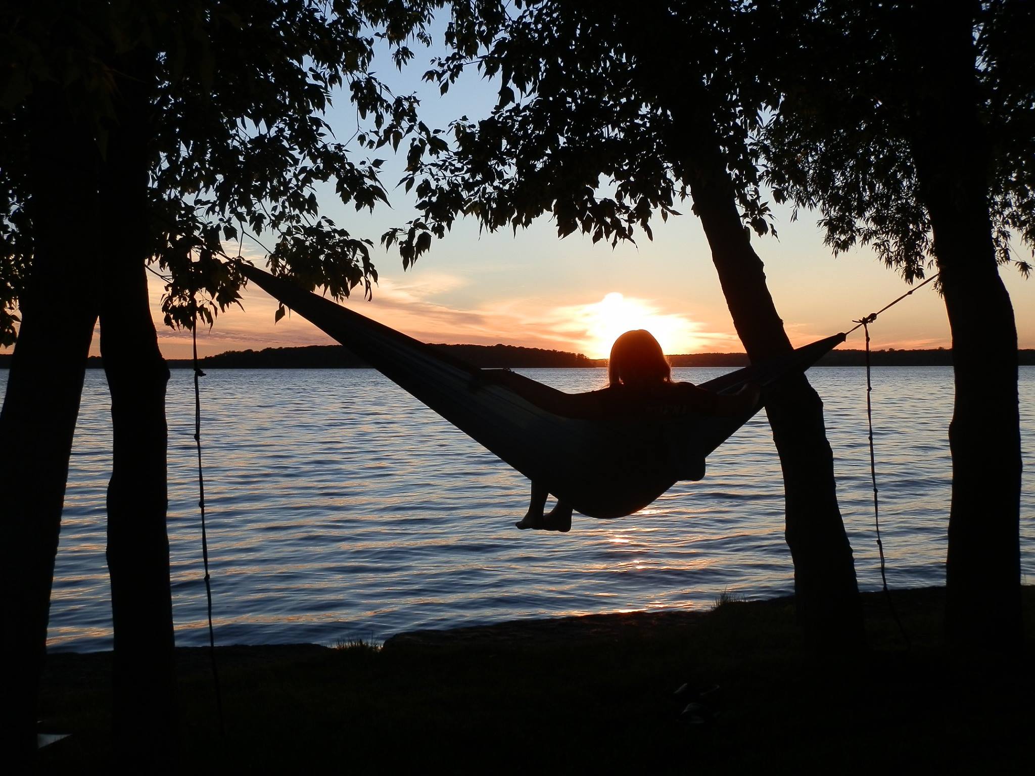 Woman Relaxing on a Hammock Swing